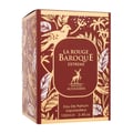 Maison Alhambra Baroque Rouge Extrait 100ml by Maison Alhambra — Red faceted glass perfume bottle with gold cap next to a red and gold ornate box with a bird and deer motif | Maison Alhambra Baroque Rouge Extrait 100ml by Maison Alhambra — Botol kaca merah berfaset dengan penutup emas di sebelah kotak merah dan emas