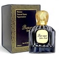 Maison Alhambra Baroque Satin Oud 100ml — A dark glass perfume bottle with a gold textured cap sits next to its matching dark box with gold geometric patterns. | Maison Alhambra Baroque Satin Oud 100ml — Botol minyak wangi kaca gelap dengan penutup bertekstur emas terletak di sebelah kotak gelapnya dengan corak