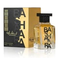Ard Al Zaafaran Bashaara Eau De Parfum 100ml — Clear glass bottle with yellow liquid and black text "BA SHAARA" repeated vertically, black wooden cap | Ard Al Zaafaran Bashaara Eau De Parfum 100ml — Botol kaca jernih dengan cecair kuning dan teks hitam "BA SHAARA" berulang secara menegak, penutup kayu hitam