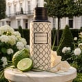 Maison Asrar Belgravia by Maison Asrar Eau de Parfum — A cream-colored perfume bottle with a black patterned design and a black textured cap, featuring a black label with white text 'BELGRAVIA ROYAL COLLECTION'.