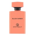Grandeur Blush Amber 100ml — An orange perfume bottle and its matching orange box with geometric patterns, displayed side-by-side against a white background. | Grandeur Blush Amber 100ml — Botol minyak wangi oren dan kotak orennya yang sepadan dengan corak geometri, dipaparkan bersebelahan di atas latar belakang putih.