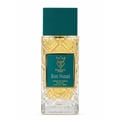 Bujairami Born Nomad — Teal leather case and gold-accented glass perfume bottle with teal cap, both featuring the Bujairami