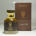Bujairami Boss Life 100ml Extrait de Parfum — Clear glass bottle with dark label, gold cap, and crown logo