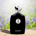 Maison Alhambra Cassius 100ml — Black perfume bottle and box with silver accents and a deer logo, featuring the name 'Cassius' in white. | Maison Alhambra Cassius 100ml — Botol dan kotak minyak wangi hitam dengan aksen perak dan logo rusa, menampilkan nama 'Cassius' dalam warna putih.