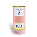 Maison Alhambra Chic Velvet Pink Secret for Women 100ml — A pink cylindrical box stands next to a clear glass perfume bottle with a black cap and gold accents. The box and bottle label feature a deer silhouette and text. | Maison Alhambra Chic Velvet Pink Secret for Women 100ml — Kotak silinder merah jambu berdiri di