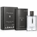 Armaf Club de Nuit Precieux II — Black textured box with silver text and a clear glass perfume bottle with a silver chain and charm.