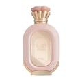 Zimaya Daiman Eden Eau De Parfum 100ml by Zimaya — A pink textured perfume bottle with gold accents stands next to its matching coral-orange textured box with gold marbling. | Zimaya Daiman Eden Eau De Parfum 100ml by Zimaya — Sebotol minyak wangi merah jambu bertekstur dengan perincian emas berdiri di sebelah kotak