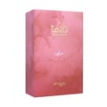 Zimaya Daiman Eden Eau De Parfum 100ml by Zimaya — A pink textured perfume bottle with gold accents stands next to its matching coral-orange textured box with gold marbling. | Zimaya Daiman Eden Eau De Parfum 100ml by Zimaya — Sebotol minyak wangi merah jambu bertekstur dengan perincian emas berdiri di sebelah kotak