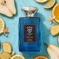Bujairami Enforcer Eau de Parfum — Blue faceted glass bottle with gold cap next to blue box with gold logo