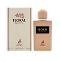 Maison Alhambra Floral Bloom — A beige perfume bottle with a peach cap stands next to its matching beige box, both featuring floral and deer motifs. | Maison Alhambra Floral Bloom — Botol minyak wangi berwarna krim dengan penutup pic berdiri di sebelah kotak sepadan berwarna krim, kedua-duanya menampilkan motif bunga