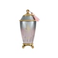 Zimaya Ghali Elegant Eau De Parfum 100ml by Zimaya — A pink patterned box with building facade design stands next to a fluted glass perfume bottle with a gold base and a pink tassel on the cap. | Zimaya Ghali Elegant Eau De Parfum 100ml oleh Zimaya — Peti merah jambu bercorak dengan reka bentuk fasad bangunan berdiri