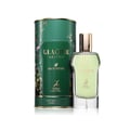 Maison Alhambra Glacier Heaven 100ml — Green floral patterned cylindrical box and a clear glass perfume bottle with green liquid and gold cap, set against a white background. | Maison Alhambra Glacier Heaven 100ml — Kotak silinder hijau bermotif bunga dan botol minyak wangi kaca jernih dengan cecair hijau dan penutup