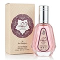Ard Al Zaafaran Hareem Al Sultan EDP 50ml — A pink perfume bottle with a silver cap and a patterned label sits next to its matching pink and gold patterned box with a circular purple design. | Ard Al Zaafaran Hareem Al Sultan EDP 50ml — Sebotol minyak wangi merah jambu dengan penutup perak dan label bercorak terletak