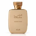 RASASI Hawas Addiction by Rasasi 100ml EDP — Gold bottle and matching box with textured gold panel and Arabic calligraphy.