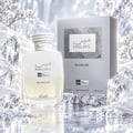 RASASI Hawas Blanche by Rasasi 100ml EDP — White rope-tied cap perfume bottle next to its silver textured box, both featuring the Hawas Blanche logo and text.