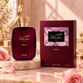 RASASI Hawas Diva by Rasasi 100ml EDP — A deep burgundy perfume bottle with gold accents and the brand name 'HAWAS' in Arabic and English. A matching burgundy box with a pink snakeskin pattern is displayed next to it.