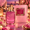 RASASI Hawas Dreams by Rasasi 100ml EDP — Pink textured box and a pink glass perfume bottle with a gold textured cap, set against a white background.