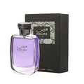 Rasasi Hawas For Him Eau De Parfum 100ml by Rasasi — A clear glass perfume bottle with purple liquid and a textured grey cap sits next to a black product box with a snakeskin pattern label. | Rasasi Hawas For Him Eau De Parfum 100ml by Rasasi — Botol minyak wangi kaca jernih dengan cecair ungu dan penutup kelabu