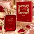 RASASI Hawas Love For Her by Rasasi 100ml EDP — Red perfume bottle with gold accents and matching red box with gold patterned detail, displayed together on a white background.