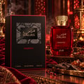 RASASI Hawas Majestic by Rasasi 100ml EDP — Red glass perfume bottle with gold textured cap, next to a black and red textured box with gold text and snake skin pattern.