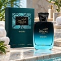RASASI Hawas Malibu by Rasasi 100ml EDP — Teal textured box with snake skin pattern and gold text next to a gradient blue glass perfume bottle with a coiled snake cap.