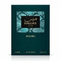 RASASI Hawas Malibu by Rasasi 100ml EDP — Teal textured box with snake skin pattern and gold text next to a gradient blue glass perfume bottle with a coiled snake cap.