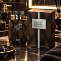 RASASI Hawas Private Terra by Rasasi 100ml EDP — A brown snakeskin-patterned perfume box and bottle with silver accents and a coiled snake cap