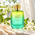 RASASI Hawas Verde by Rasasi 100ml EDP — Green box with gold accents next to a gradient green and yellow glass perfume bottle with a gold textured cap.