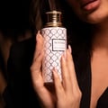 Maison Asrar Heritage by Maison Asrar 100ml EDP Unisex — White bottle with gold geometric pattern and gold fluted cap