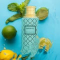 Maison Asrar Imperial by Maison Asrar 100ml EDP Unisex — A teal perfume bottle with a gold geometric pattern and a gold cap, featuring a gold-bordered label with 'IMPERIAL' and 'ROYAL COLLECTION' text.