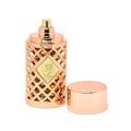 Ard Al Zaafaran Jazzab Gold Eau De Parfum 100ml — A gold-toned perfume bottle with a diamond-patterned cage sits next to its matching patterned box on a white background. | Ard Al Zaafaran Jazzab Gold Eau De Parfum 100ml — Botol minyak wangi berwarna emas dengan sangkar bermotif berlian duduk bersebelahan dengan kotak
