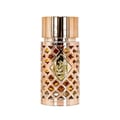 Ard Al Zaafaran Jazzab Gold Eau De Parfum 100ml — A gold-toned perfume bottle with a diamond-patterned cage sits next to its matching patterned box on a white background. | Ard Al Zaafaran Jazzab Gold Eau De Parfum 100ml — Botol minyak wangi berwarna emas dengan sangkar bermotif berlian duduk bersebelahan dengan kotak