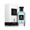 Maison Alhambra Jean Lowe Fantasme — Blue liquid in a clear glass bottle with a black cap, next to a white textured cylindrical box with black labels featuring a deer logo and text. | Maison Alhambra Jean Lowe Fantasme — Cecair biru dalam botol kaca jernih bertutup hitam, bersebelahan kotak silinder bertekstur putih