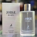 Maison Alhambra Jorge Di Profumo Aqua — A white box and a frosted glass bottle of Jorge Di Profumo Aqua perfume, with a deer logo on both. | Maison Alhambra Jorge Di Profumo Aqua — Kotak putih dan botol kaca beku minyak wangi Jorge Di Profumo Aqua, dengan logo rusa pada kedua-duanya.