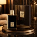 Khadlaj Karus Gold Absolu by Khadlaj 100ml EDP Unisex — Black ribbed bottle with gold accents and cap, next to its dark brown box with gold vertical lines and a gold label.