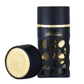 Lattafa Khalta Blend Of Lattafa Eau De Parfum 100ml — A dark blue perfume bottle with gold accents and a cutout design, next to its matching dark box and cap, all on a white reflective surface. | Lattafa Khalta Blend Of Lattafa Eau De Parfum 100ml — Botol minyak wangi biru gelap dengan aksen emas dan rekaan potongan
