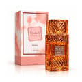Lattafa Khamrah Mira by Lattafa EDP Unisex — Amber glass perfume bottle with a textured cap, next to its pink and blue watercolor-style box with gold accents.