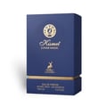 Maison Alhambra Kismet Lunar Magic 100ml — A clear glass perfume bottle with a gold cap and blue gradient base sits next to its matching blue and gold box on a white background. | Maison Alhambra Kismet Lunar Magic 100ml — Botol minyak wangi kaca jernih dengan penutup emas dan tapak gradien biru terletak di sebelah