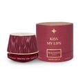 Maison Asrar Kiss My Lips by Maison Asrar 90ml EDP Unisex — Red cylindrical packaging with gold accents, featuring 'KISS MY LIPS' and 'MAISON ASRAR' text. The perfume bottle has a textured, deep red cap and a black base with gold trim, displaying 'Kiss My Lips' and volume details.