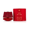 Maison Asrar Kiss My Lips by Maison Asrar 90ml EDP Unisex — Red cylindrical packaging with gold accents, featuring 'KISS MY LIPS' and 'MAISON ASRAR' text. The perfume bottle has a textured, deep red cap and a black base with gold trim, displaying 'Kiss My Lips' and volume details.