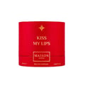 Maison Asrar Kiss My Lips by Maison Asrar 90ml EDP Unisex — Red cylindrical packaging with gold accents, featuring 'KISS MY LIPS' and 'MAISON ASRAR' text. The perfume bottle has a textured, deep red cap and a black base with gold trim, displaying 'Kiss My Lips' and volume details.