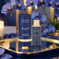 Maison Asrar Legacy by Maison Asrar 100ml EDP Unisex — Blue cylindrical box and matching perfume bottle with gold accents and intricate geometric pattern