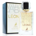 Maison Alhambra Leonie for Women by Maison Alhambra 100ml — A perfume bottle and its box are displayed side-by-side against a white background. The box is black and white with gold lettering and a deer logo. The bottle is clear glass with gold lettering and a deer logo. | Maison Alhambra Leonie for Women by Maison