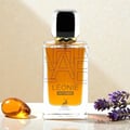 Maison Alhambra Leonie Intense by Maison Alhambra 100ml — A perfume box and bottle are shown side-by-side against a white background. The box has black and gold lettering and a deer logo. The bottle is clear glass with gold lettering and a gold and black cap. | Maison Alhambra Leonie Intense by Maison Alhambra 100ml —