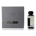 Afnan Lynked Freedom by Afnan — Gray gift box with embossed circle and text, next to a clear glass perfume bottle with black