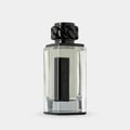 Afnan Lynked Freedom by Afnan — Gray gift box with embossed circle and text, next to a clear glass perfume bottle with black