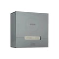 Afnan Lynked Freedom by Afnan — Gray gift box with embossed circle and text, next to a clear glass perfume bottle with black
