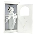 Lattafa Maahir Honor 100ml by Lattafa — White perfume box with a sculpted white horse head in an arched niche, Arabic calligraphy design, and brand text. | Kotak minyak wangi putih dengan kepala kuda putih berukir dalam niche melengkung, reka bentuk kaligrafi Arab, dan teks jenama.