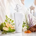 Lattafa Maahir Honor 100ml by Lattafa — White perfume box with a sculpted white horse head in an arched niche, Arabic calligraphy design, and brand text. | Kotak minyak wangi putih dengan kepala kuda putih berukir dalam niche melengkung, reka bentuk kaligrafi Arab, dan teks jenama.