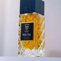 Bujairami Mafia Boss — Clear glass perfume bottle with gold liquid next to a black presentation box with gold logo and text